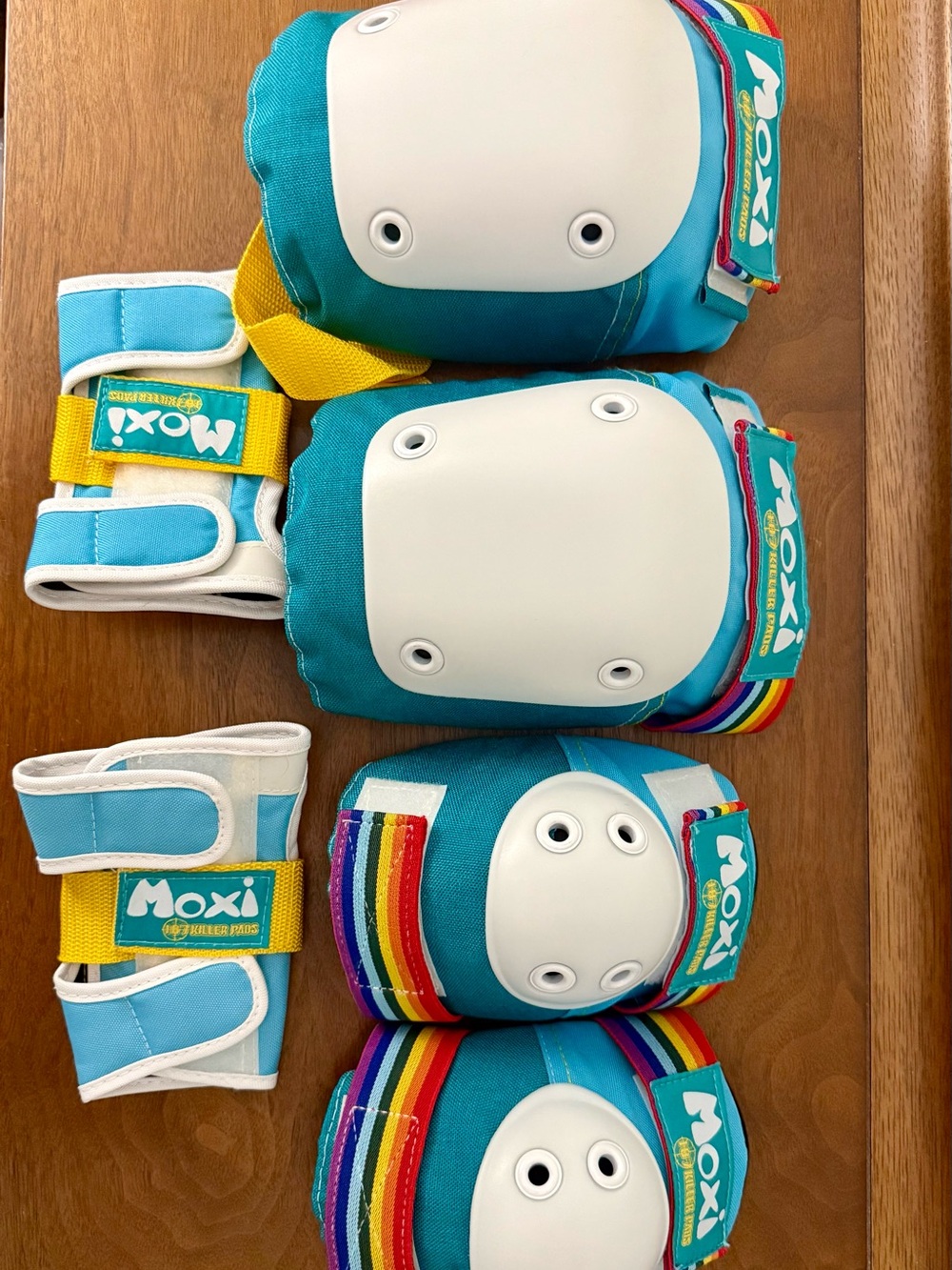 Moxi Roller Skates Teal Wrist, Elbow, and Knee Pad Set with Rainbow Accents - Picture 4 of 4